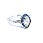 18ct White Gold Marquise Diamond & French-Cut Sapphire Halo Ring