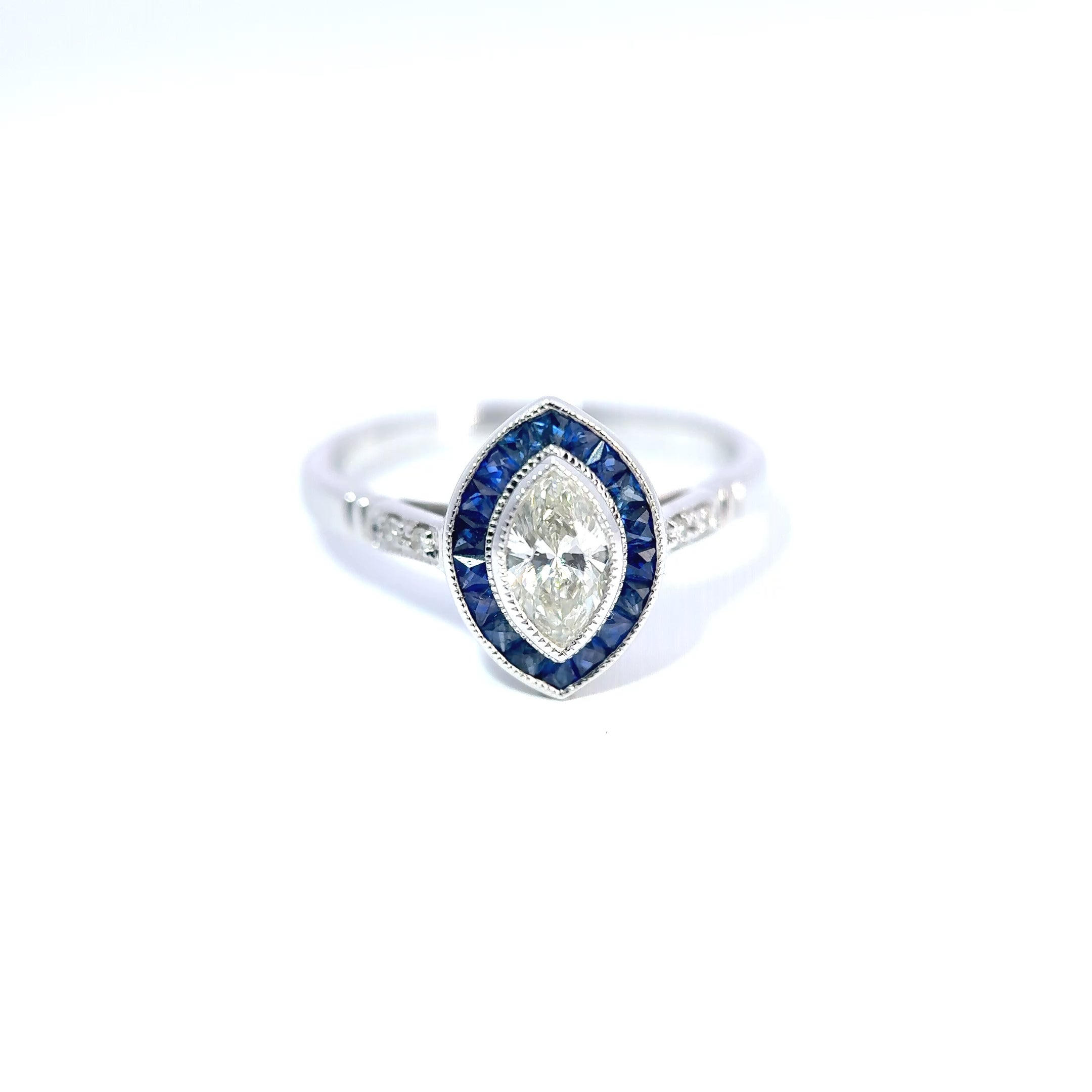18ct White Gold Marquise Diamond & French-Cut Sapphire Halo Ring