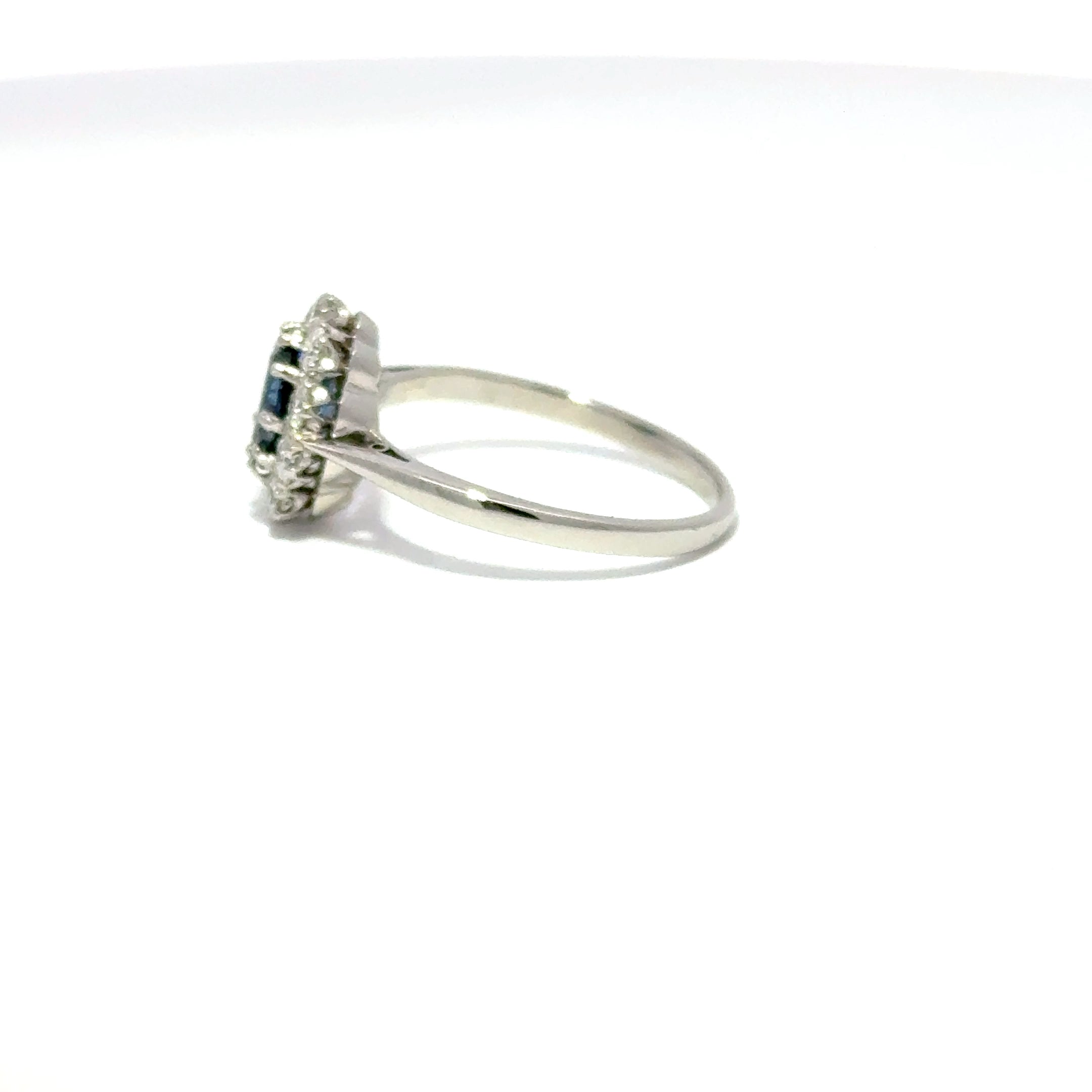 Platinum Oval Sapphire & Diamond Cluster Ring