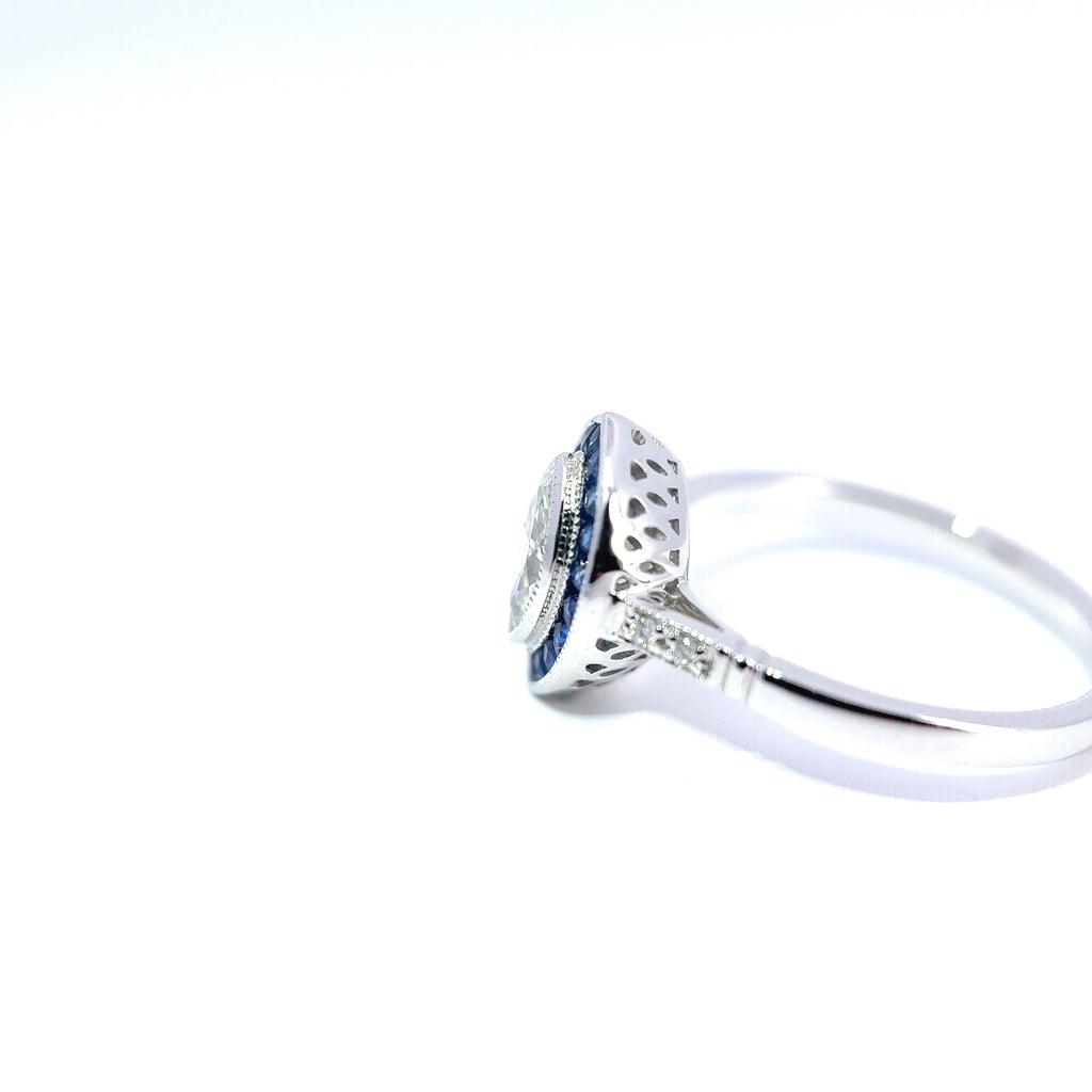 18ct White Gold Marquise Diamond & French-Cut Sapphire Halo Ring