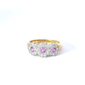 Anillo de oro amarillo de 18 quilates con zafiros rosas y diamantes